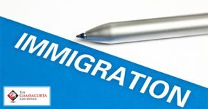 A pen with the word Immigration 