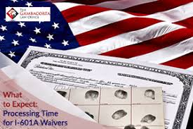 American flag and I-601A Waiver documents
