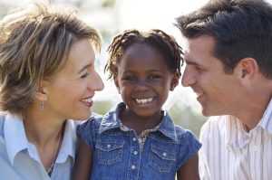 Couple with adopted daughter