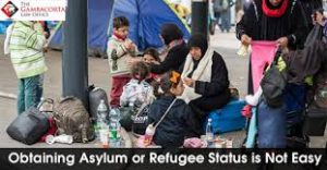 Refugee family huddled together