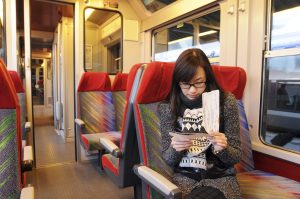 Woman riding a train